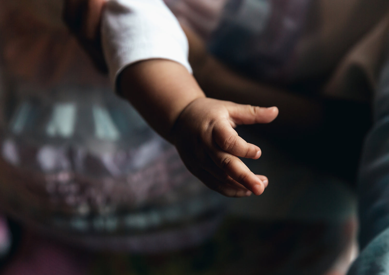 Baby's Hand Reaching Out | Metropolitan Breastfeeding